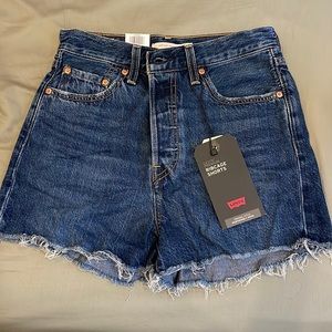 Levi’s Ribcage blue denim shorts size 28. Tags still on. Originally $80
